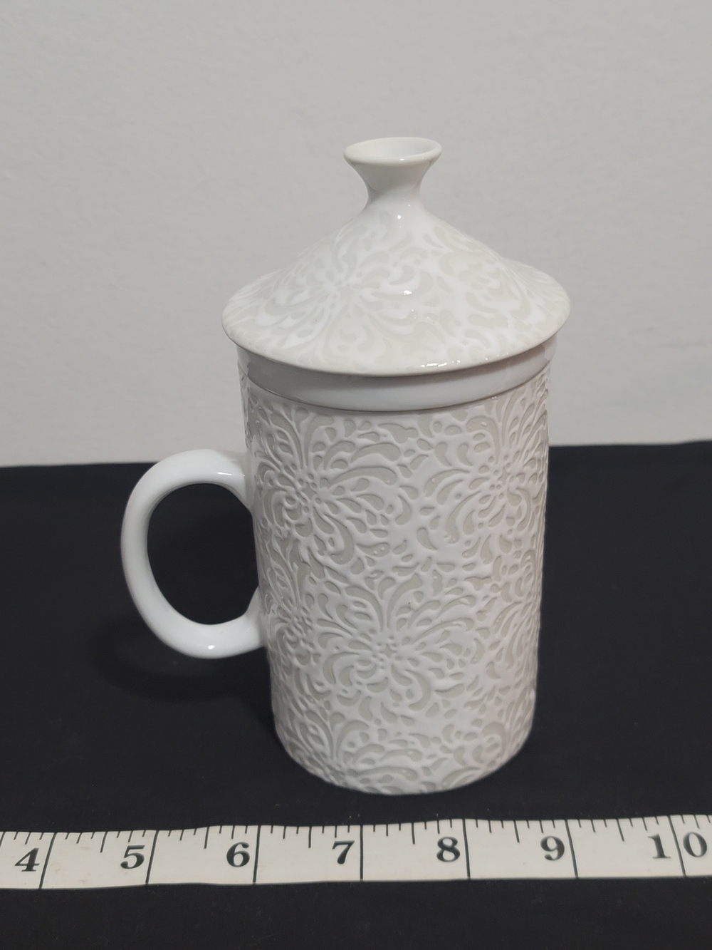 Cost Plus World Market White Embossed Ceramic Tea Strainer Mug with Lid